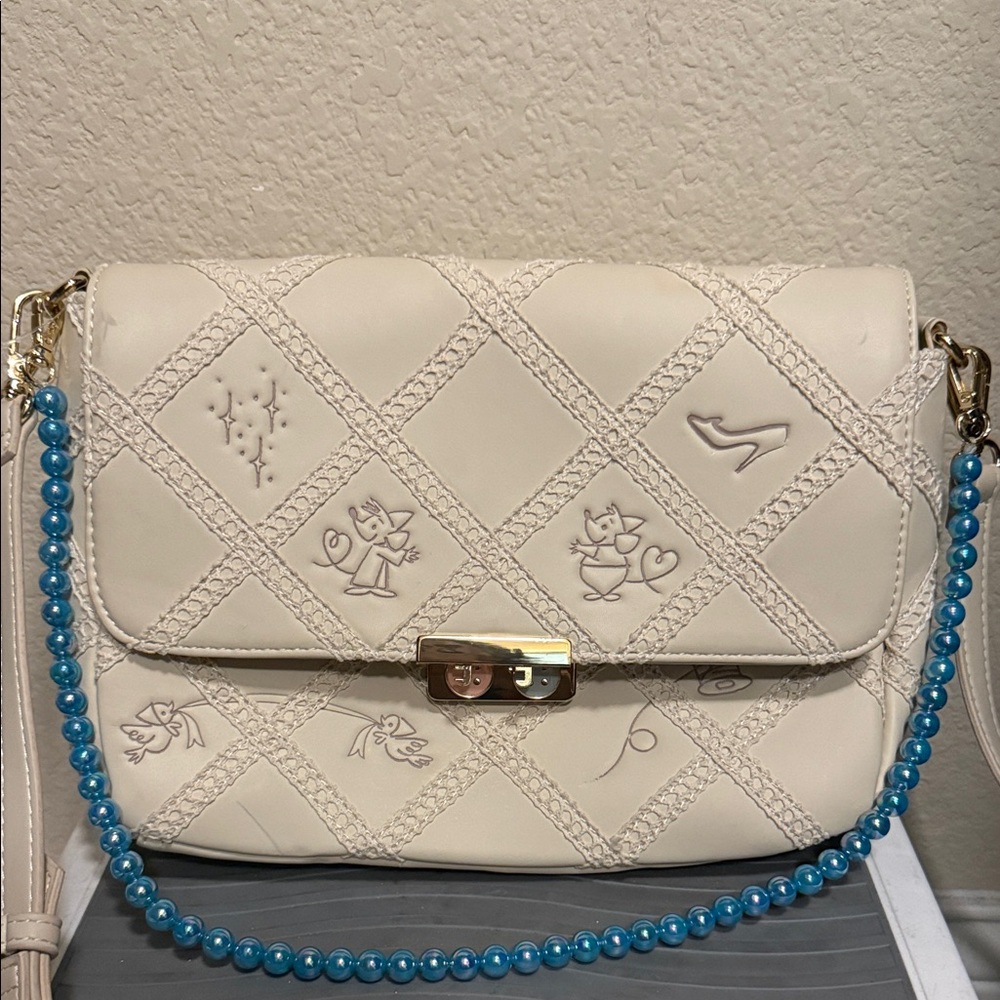 Her Universe Cream Crossbody Bag with Blue Beaded Strap